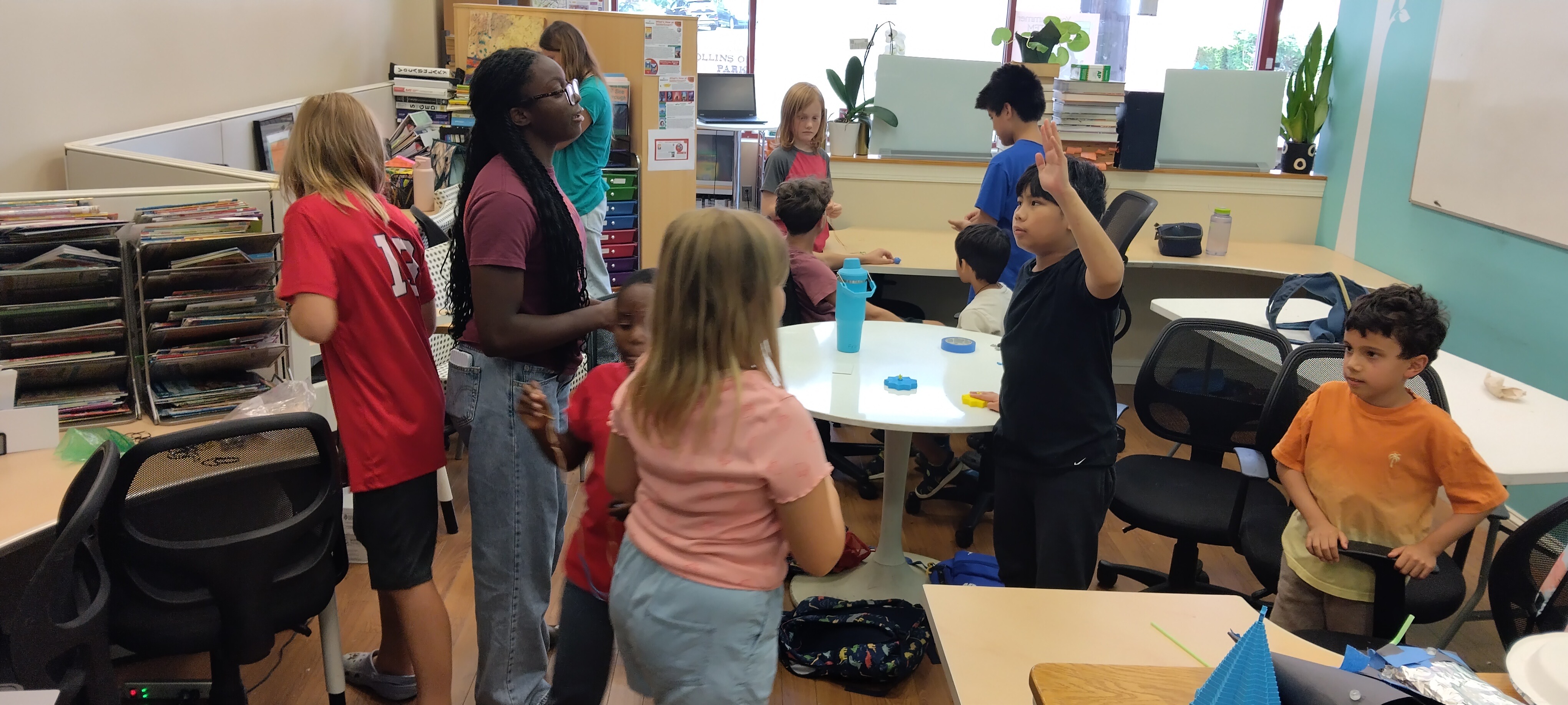Students experimenting with materials during a plantingSTEMs workshop
